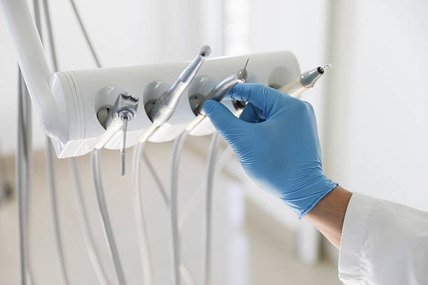 Professional Tooth Extraction technician working in Weston Lakes, TX